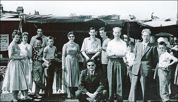 Photograph of Mission Room members manning a carnival stall c1954
