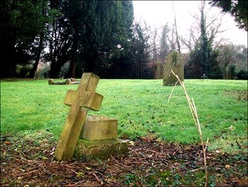 Fallen gravestone cross