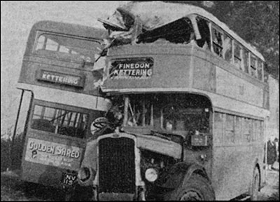 The aftermath of the collision of two double-decker buses which occurred i thick fog near Burton Latimer in September 1952