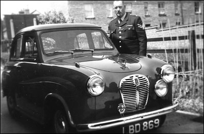 Sergeant George Thurlow with Burton's first police car - an Austin A35
