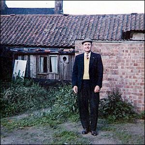 My dad at rear of Colin Plowman's barbers c.1966