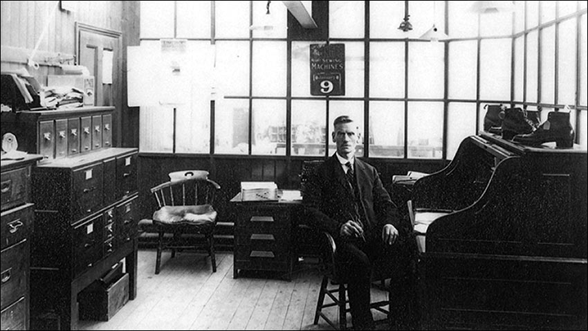 Photograph of William Henry Buckby in his office taken in about 1933.