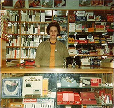 Photograph of Mrs June Smith at the newsagents shop