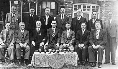 Photograph of the Darts Team taken in the 1950s.