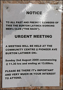 Photograph of a notice advertising an urgent meeting for members past and present.
