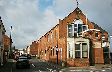 Modern photograph of The Britannia showing the bricked up frontage.