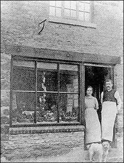 11 Kettering Road, c1920, with Joseph and Sarah Ann Wallis pictured in the doorway
