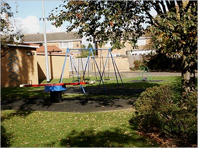 Photograph of Children's Playground showing swings and seesaw
