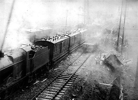 Photographs showing a frieght train derailment on 26 March 1936