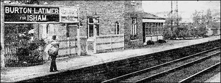 Photograph showing the Station Maaster waiting with a mail bag 1923