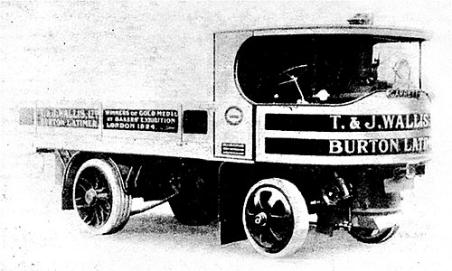 Photograph showing a Garrett undertype steam wagon operated by T & J Wallis, flour millers, in 1925, from their mills in Station Road.  The vehicle was known locally as "Puffing Billy".