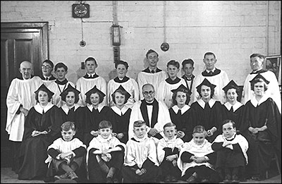 Choir with Revd R W Sharpley c1955 inside the Church Room