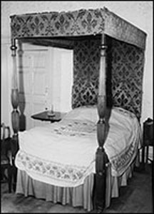 An 18th century four-poster bed, part of the contents of the Rectory.