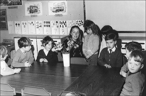 Miss mason with children in her class