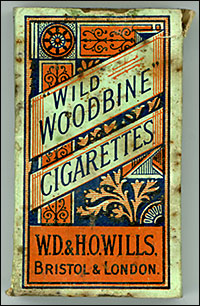 Photograph showing the front of a packet of Woodbine cigarettes.
