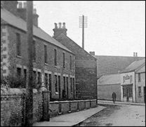 The row of houses and shops on the High Street between Bakehouse Lane and Church Street, before the development of the Co-op