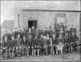 Workers outside the office of Lloyds Ironstone Company in Polwell Lane