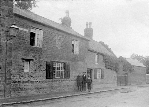 The Gilliats outside their house in 1 Church Street