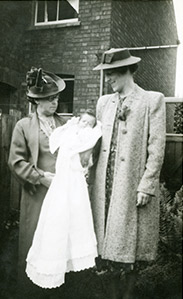 Annie Potter with her granddaughter Celia at the christening, 1940