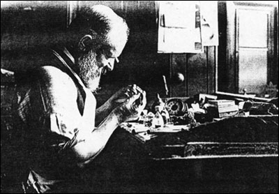Stan Simons' grandfather at work with a clock