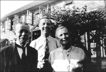 Photograph of Harry Holley, his wife and his son