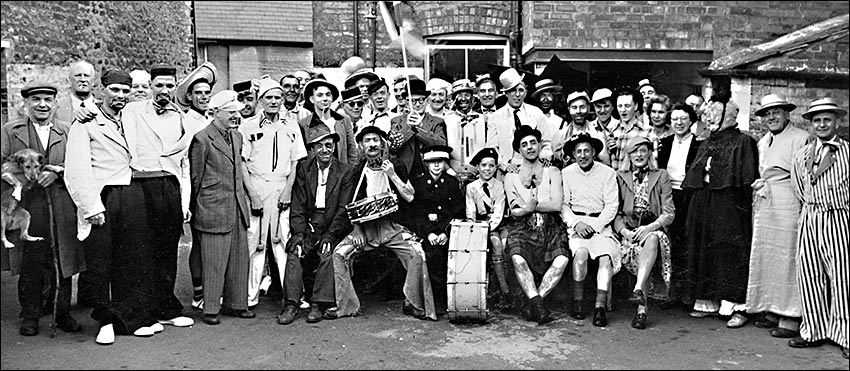 A Fun Day at the Horse & Groom public house.  Gerald is pictured fourth from the right (middle row) with his younger brother, Norman, just behind him on his right.  Gerald's father is third from the left wearing a suit and a peaked cap.