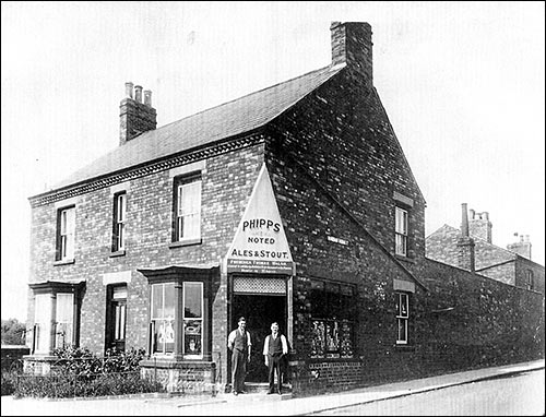 Photograph of Walsh's Off-licence taken in 1927. It was later known as "The Grapevine".