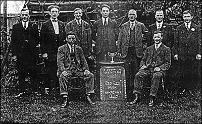 photograph of the Red Cow Push Ha'penny Team in the late 1920s.