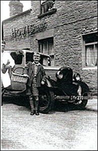 Stan Bettles and young John Newing with their bread van.