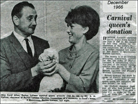 Alf Caffrey receiving the proceeds of Carol Allen's coffee evening