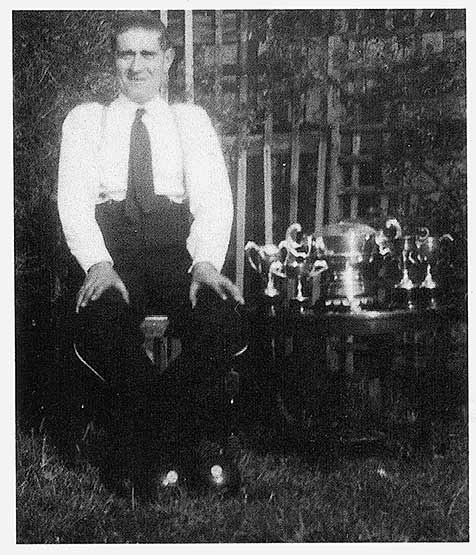 Freddie Mann with some of his bowls trophies - 1950 