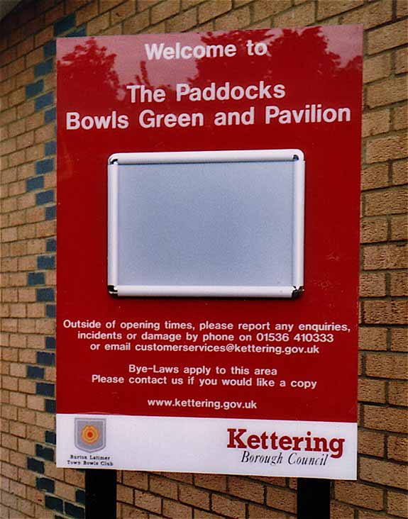 Kettering Borouogh Council sign for The Paddocks, Bowling Green and Pavilion
