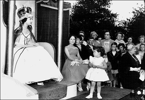 1958 Queen Pat Johnson at her crowning. Jennifer Smith is the attendant