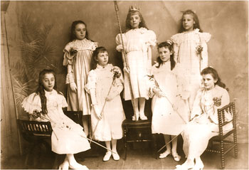 Photograph showing the cast of Cinderella: Standing at back: L to R: Lizzie Butlin, Lucy Tailby, Emma Smith.  Front L to R: Gwen Coles, Mabel Talbutt, Violet Boardman, Grace King