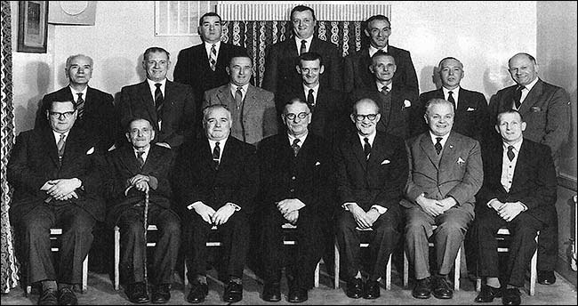 Photograph of members of Burton Latimer Conservative & Unionist Club Ltd on the Golden Jubilee 1912-1962.  Cnr A F Mutlow is shown on the right of the second row