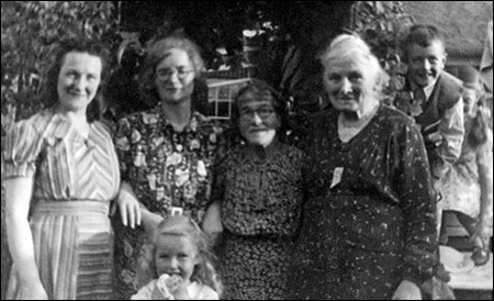 Family photograph in the garden at Station Road. Neville is pictured top right.