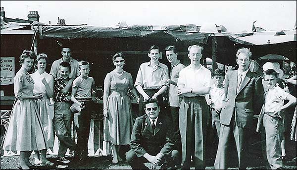 Photograph of Mission Room members manning a carnival stall c1954