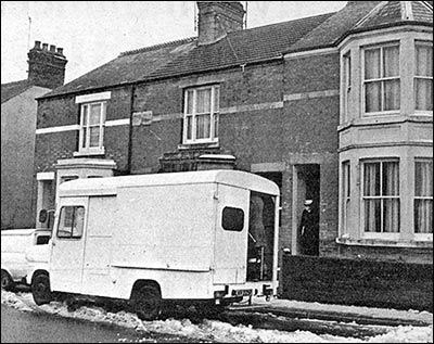 Photograph of Police officers at the home of Winnie Love at Station&nbsp;Road