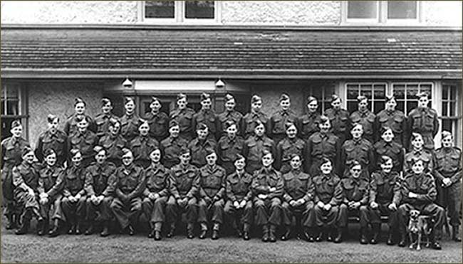 Photograph of the Burton Latimer Home Guard during the II World War. Mr Keith Coles is sixth from the left on the front row