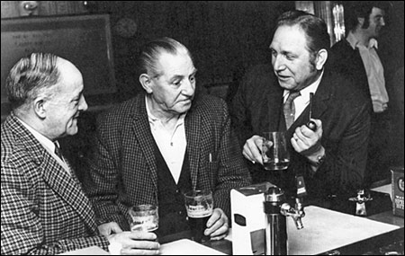 Photograph of a group of members taken inside The Rack.